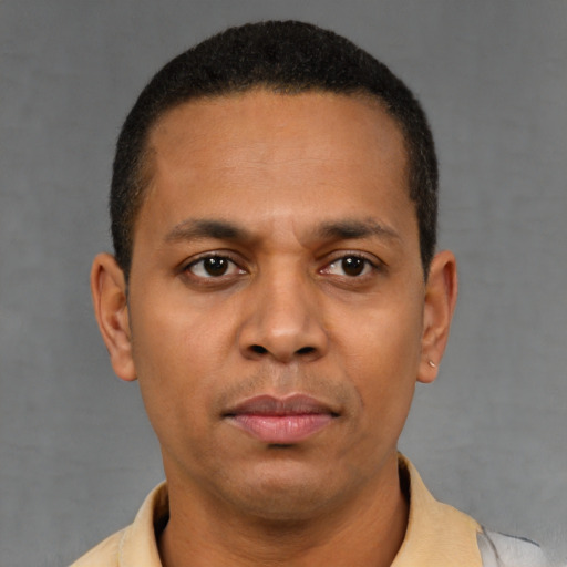 Neutral latino young-adult male with short  brown hair and brown eyes