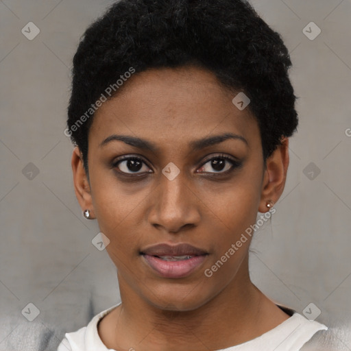 Joyful black young-adult female with short  black hair and brown eyes