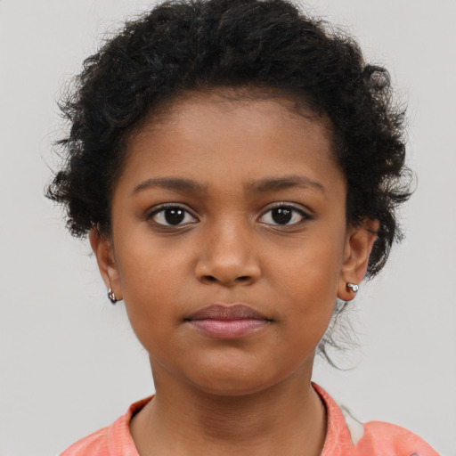 Neutral black child female with short  brown hair and brown eyes