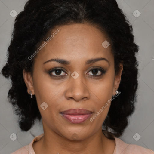 Joyful black adult female with medium  brown hair and brown eyes