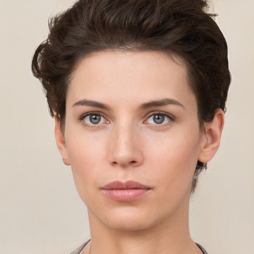 Neutral white young-adult female with short  brown hair and brown eyes