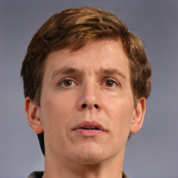 Neutral white adult male with short  brown hair and brown eyes