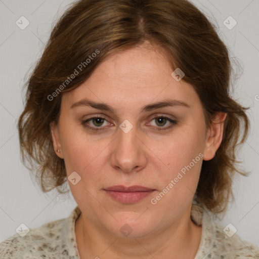 Joyful white young-adult female with medium  brown hair and green eyes