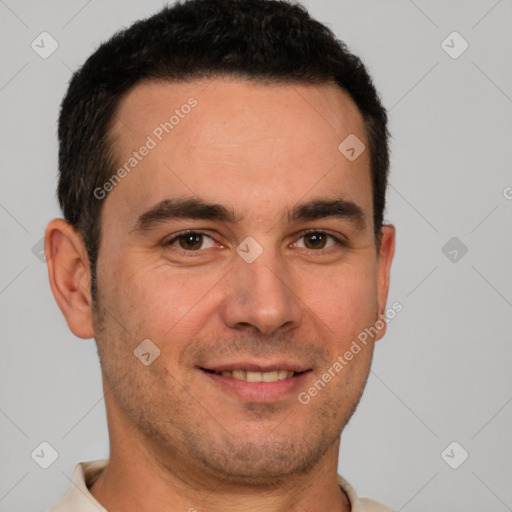 Joyful white young-adult male with short  brown hair and brown eyes