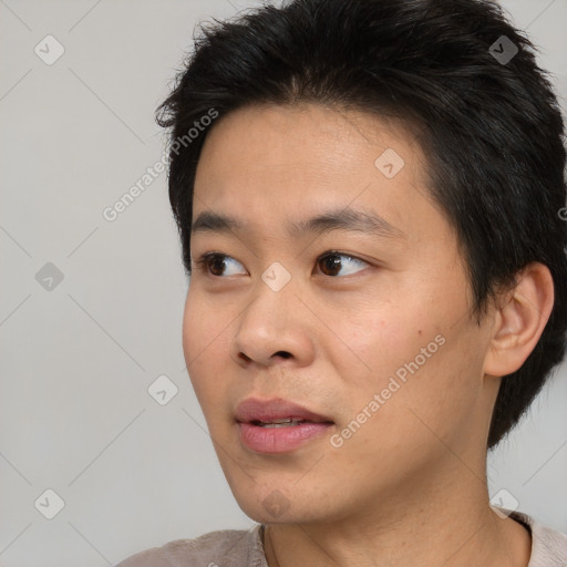 Neutral white young-adult male with short  black hair and brown eyes
