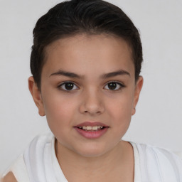 Joyful white child female with short  brown hair and brown eyes