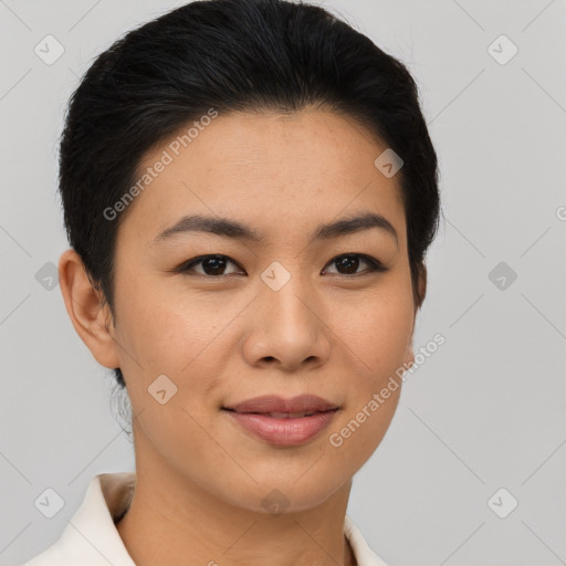 Joyful asian young-adult female with short  brown hair and brown eyes