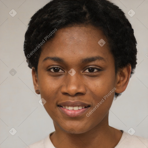 Joyful black young-adult female with short  black hair and brown eyes