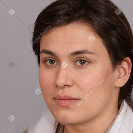 Neutral white young-adult female with medium  brown hair and brown eyes