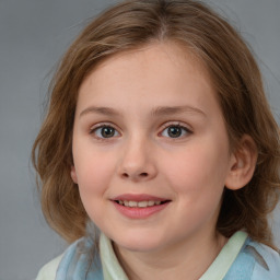 Joyful white child female with medium  brown hair and brown eyes