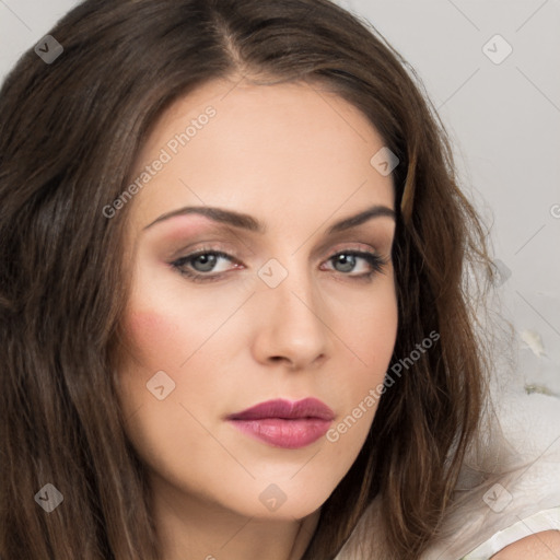 Neutral white young-adult female with long  brown hair and brown eyes