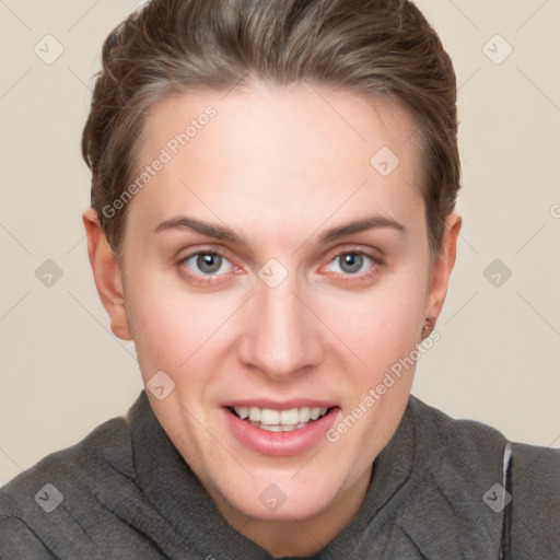 Joyful white young-adult female with short  brown hair and grey eyes