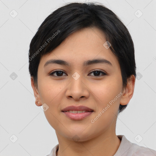 Joyful asian young-adult female with short  black hair and brown eyes