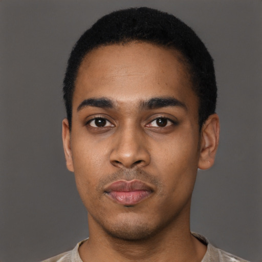 Neutral black young-adult male with short  black hair and brown eyes