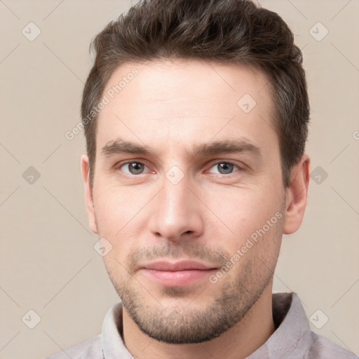 Neutral white young-adult male with short  brown hair and brown eyes