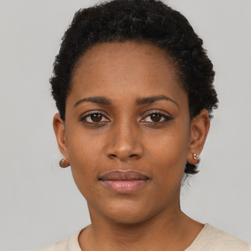 Neutral black young-adult female with short  black hair and brown eyes