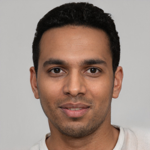 Neutral latino young-adult male with short  black hair and brown eyes