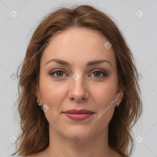 Joyful white young-adult female with long  brown hair and green eyes