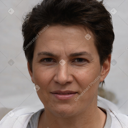 Joyful white adult female with short  brown hair and brown eyes