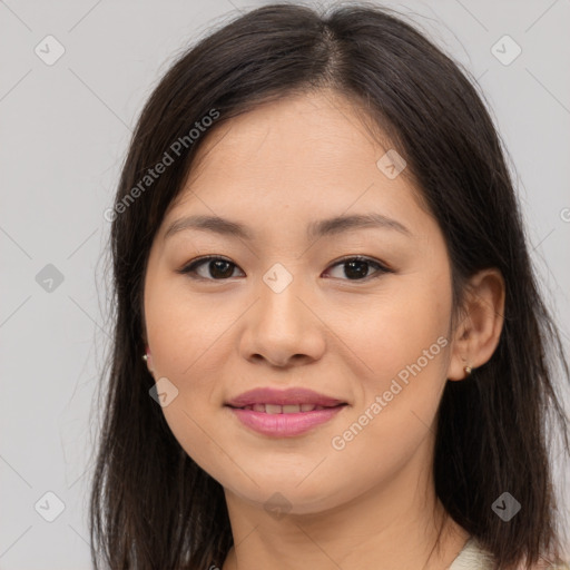 Joyful white young-adult female with long  brown hair and brown eyes