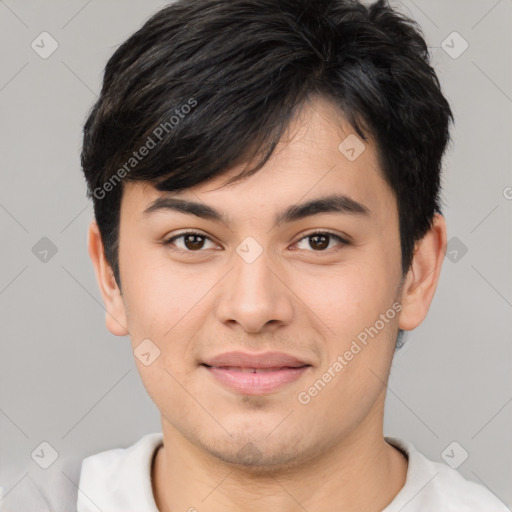 Joyful asian young-adult male with short  brown hair and brown eyes