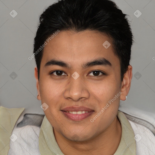 Joyful latino young-adult male with short  black hair and brown eyes