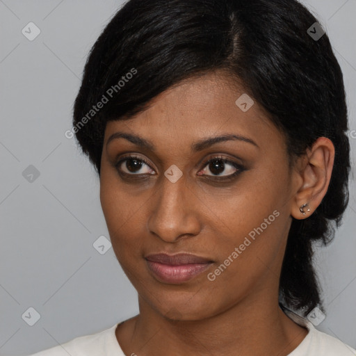 Joyful black young-adult female with medium  brown hair and brown eyes