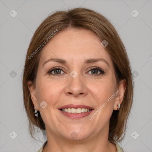 Joyful white adult female with medium  brown hair and grey eyes