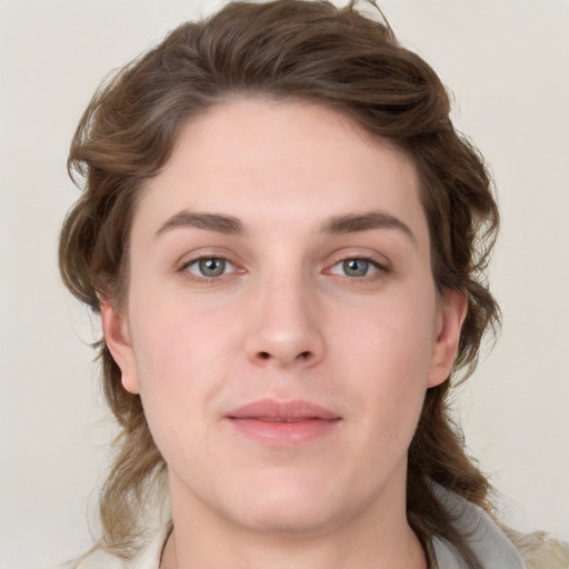 Joyful white young-adult female with medium  brown hair and grey eyes