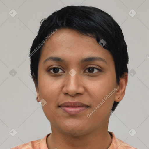 Joyful latino young-adult female with short  black hair and brown eyes