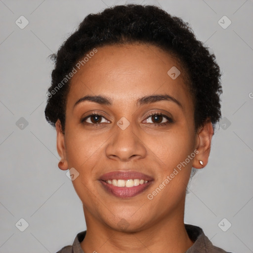 Joyful latino young-adult female with short  brown hair and brown eyes