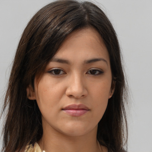 Neutral white young-adult female with long  brown hair and brown eyes