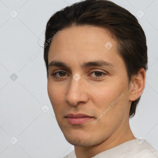 Joyful white young-adult male with short  brown hair and brown eyes