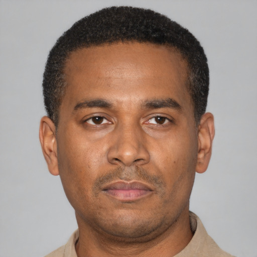 Neutral latino adult male with short  black hair and brown eyes