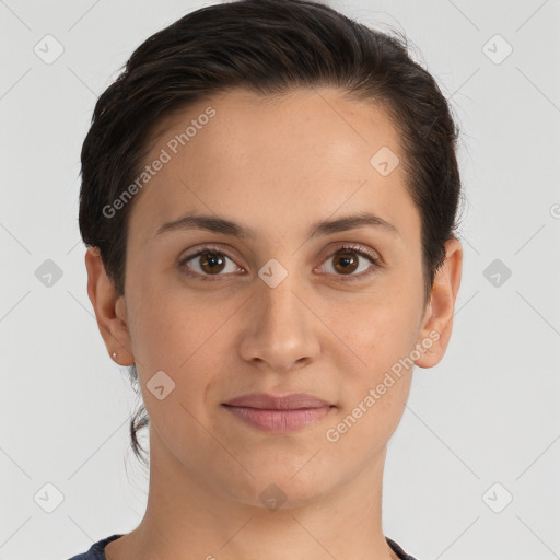 Joyful white young-adult female with short  brown hair and brown eyes