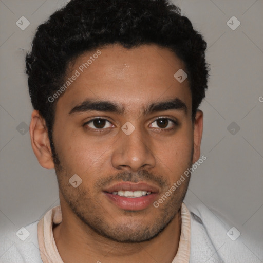 Joyful latino young-adult male with short  brown hair and brown eyes