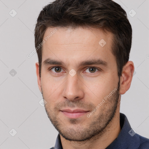 Neutral white young-adult male with short  brown hair and brown eyes