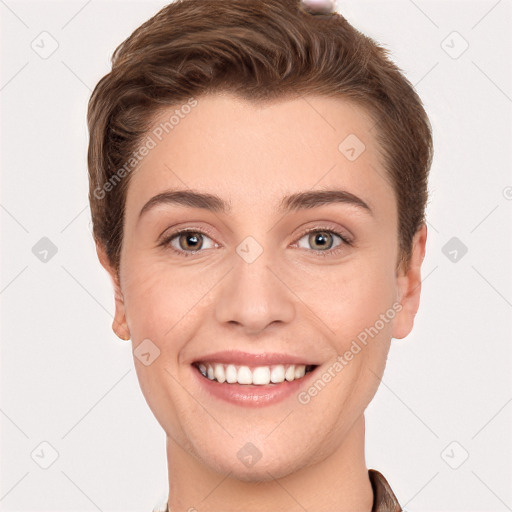 Joyful white young-adult female with short  brown hair and grey eyes