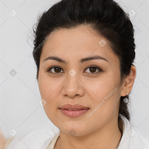 Joyful latino young-adult female with medium  brown hair and brown eyes