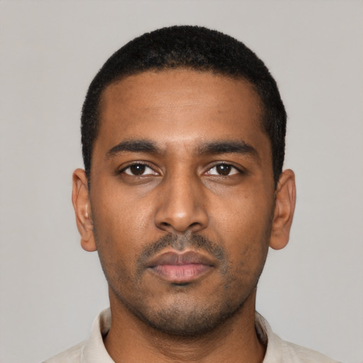 Neutral black young-adult male with short  black hair and brown eyes
