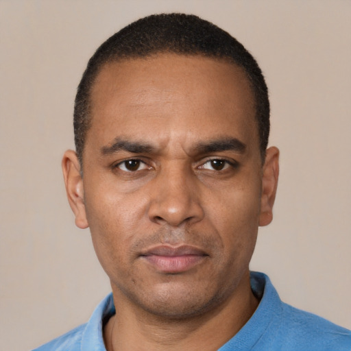 Neutral white adult male with short  black hair and brown eyes