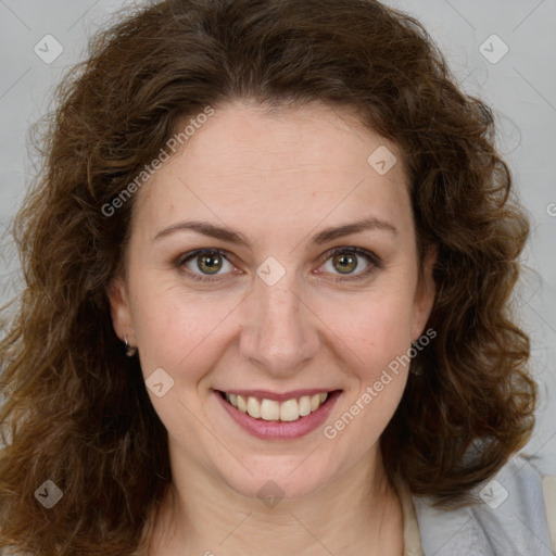 Joyful white young-adult female with medium  brown hair and green eyes