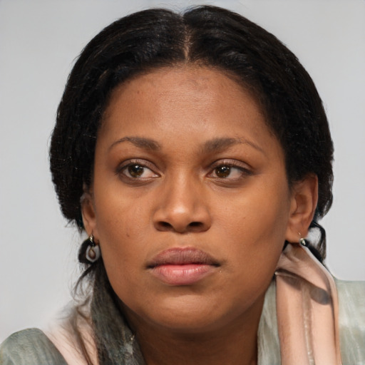 Neutral black young-adult female with medium  black hair and brown eyes