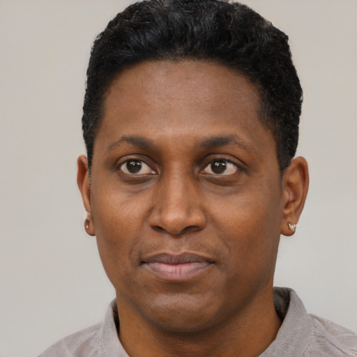 Neutral black adult male with short  black hair and brown eyes