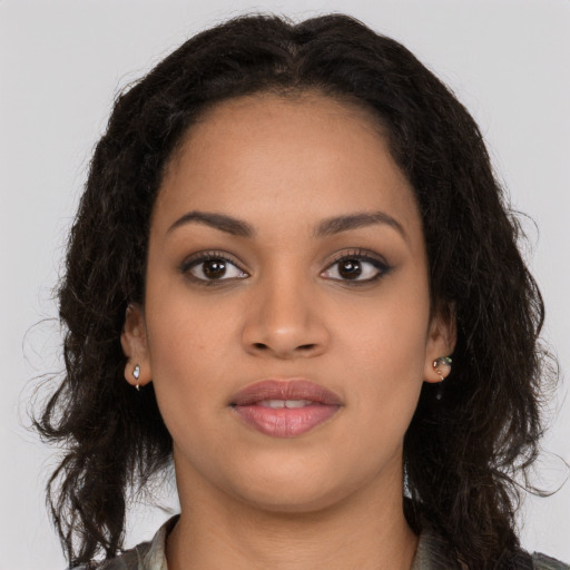 Neutral black young-adult female with long  brown hair and brown eyes