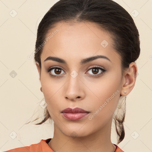 Neutral white young-adult female with long  brown hair and brown eyes