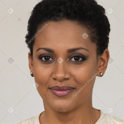 Joyful black young-adult female with short  black hair and brown eyes