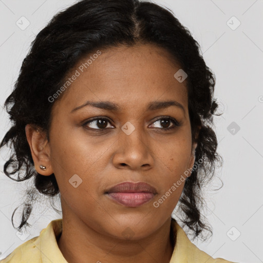 Joyful black young-adult female with medium  brown hair and brown eyes