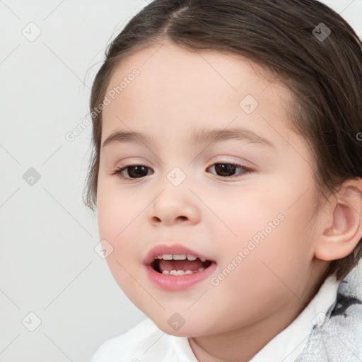 Joyful white child female with medium  brown hair and brown eyes