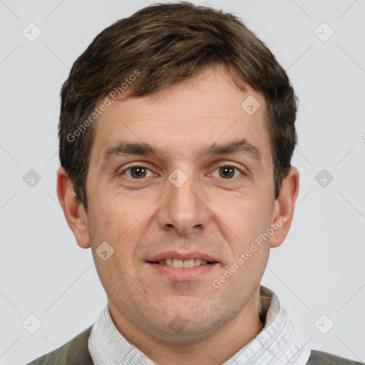 Joyful white adult male with short  brown hair and brown eyes